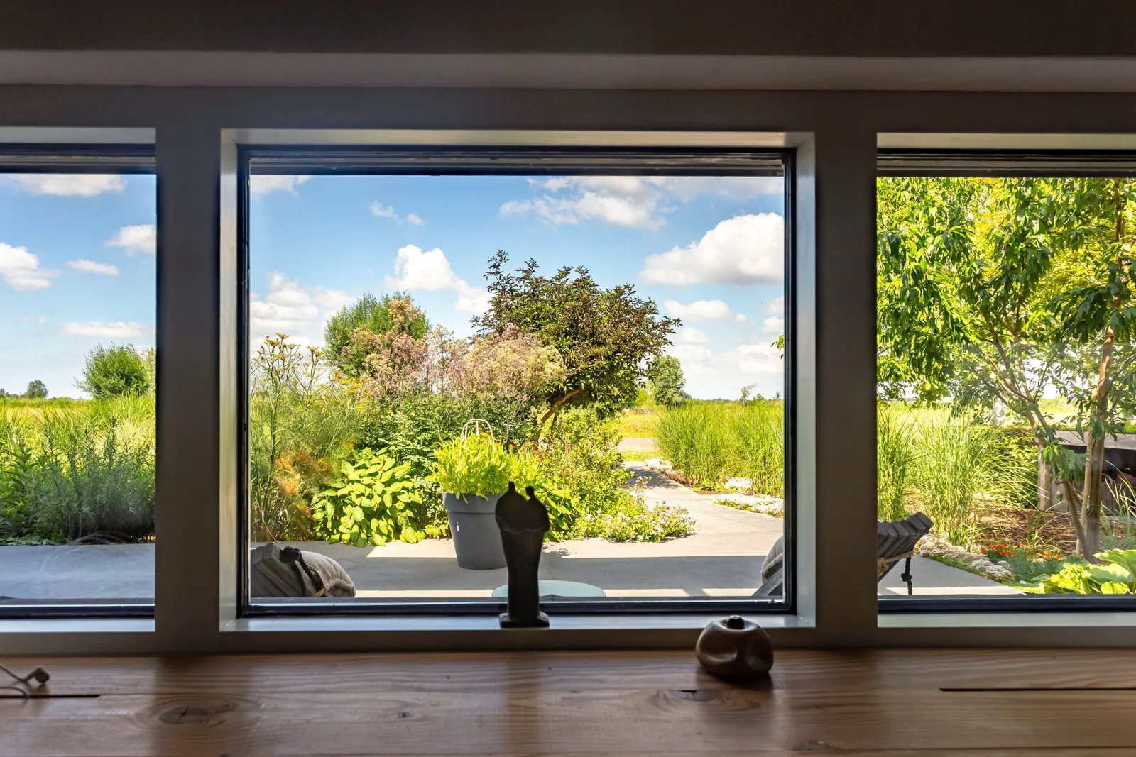 Architectuurwoning, Langelille – de woonkamer met uitzicht op het land